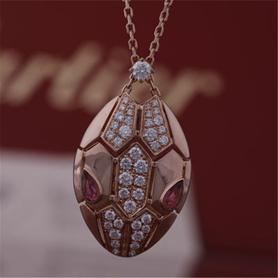 Kalite Rubellit gözlü ve başında pavé pırlantalı 18 kt pembe altın Roman Serpenti kolye fabrika