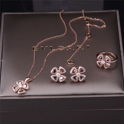 Kalite Gerçek Altın Yüksek Mücevher Fiorever Küpeler 18 kt Rose Gold Küpe, iki orta pırlanta ve pavé pırlantalı set fabrika